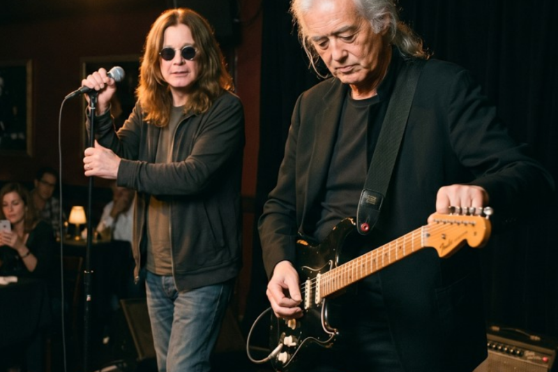 He Said “If You Know Stairway So Well, Play It” to Jimmy Page — But Ozzy Osbourne Heard Everything – YouTube  Transcripts: October 2018, a Thursday evening. Jimmy Page was sitting alone in the corner of a 60-seat blues club on a back street in Hollywood. 74 years old, silver hair falling to his shoulders, wearing a plain black jacket. Just another old Englishman that nobody around him recognized and had no reason to. In 15 minutes, Ozzy Osbourne would walk through that same club’s door, recognize him instantly, and the two of them would take that small stage together.  But before that, the young man running the open mic that night would ask Jimmy Page if he could actually get up and play with a smirk on his face. Jimmy was sitting at the table farthest from the stage, alone. His face carried deep lines now, but his eyes still held a sharp focus, the kind that silently tracked every note, every chord change on stage.  The founder of Led Zeppelin, one of the most influential guitarists in rock history, the man who wrote Stairway to Heaven. But just as he wanted it, nobody had recognized him that night. Jimmy did this a few times a year. He’d find small clubs like this, sit in a back corner, and just listen. The arenas of tens of thousands were long behind him, but the music wasn’t. Music never falls behind. The man running the open mic night was a 31-year-old guitarist named Nate Rivera. He was a Berklee College of Music graduate, and that diploma had given him both real skill and a dangerous confidence. He’d moved to Los Angeles and spent a few years trying his hand at studio work, but his big break never came. Now he hosted three nights a week at this club. Nate wasn’t a bad guy. He genuinely loved music, but the disappointment in his own career gave itself away through a subtle air of superiority that crept into his voice whenever he gave feedback. All right, who’s the next brave volunteer? He’d said into the mic. Tonight’s blues night, but you know the rules, play whatever genre you want, just make sure you bring your heart to the stage. The fourth act to take the stage that night was a young guitarist named Ryan Torres, 23 years old. He’d been chasing the dream of making it as a musician in Los Angeles for 2 years, working days at a cafe, and spending his nights looking for opportunities on small stages like this.  He plugged his burgundy Epiphone Les Paul into the amp. I’m going to play a special song tonight. He said into the mic, his voice both excited and shaky. Stairway to Heaven by Led Zeppelin. At the table in the back corner, Jimmy Page’s hand paused over his glass. Ryan closed his eyes and began playing the opening arpeggios.  His fingers were in the right position. The chords were clean, the transitions smooth. Technically, it was a good performance, but as Jimmy Page listened to those notes, the melody that had been born under his own fingers 50 years ago, he felt a strange emptiness inside. The notes were there, but the story behind them wasn’t.  When Ryan finished his performance, a warm round of applause rose from the club. Nate stepped onto the stage and gave Ryan a friendly pat on the shoulder. Great job, brother. He said, “Stairway’s not an easy piece. Your arpeggio transitions were clean. There are a few timing details to work on, but overall, really solid.” Ryan nodded with a smile.  As Nate turned to the list to call the next name, a voice came from the back corner of the club. It wasn’t loud, but the smallness of the venue carried it to everyone’s ears. The arpeggios were clean, but there was a problem with the voicing. Jimmy Page’s voice was calm, his English accent threading naturally through his words. A few people turned to look.  So did Nate. There’s a sus4 transition between the third and fourth arpeggios in the original. Jimmy continued, “Without that transition, the melodic resolution doesn’t complete.” Nate rested the hand holding the mic on his hip and looked toward the back corner. In the dim light, he saw a silver-haired old man, and a familiar expression appeared on his face, the expert look he encountered at every open mic night, the type who sat in the audience and passed judgment.  Nate smiled. It was a polite smile, but with a trace of mockery around the edges. “Sir, thank you for the feedback.” He said into the mic, “It’s impressive that you know the voicing details of Stairway to Heaven so well.” A few people in the club laughed. Nate turned directly to Jimmy. “We have a nice tradition here.  It’s easy to sit in the critic’s chair, but if you know a piece that well, you’re welcome to come up and show us yourself. The mic and a guitar are right here.” Everyone understood the real message. Jimmy Page said nothing. A faint smile appeared at the corner of his lips, and he raised his hand in a small, “No, thank you” gesture. It was the silence of a man who didn’t need to fight. Nate shrugged. “All right, then. We love our critics here, too.” A few more people laughed. Just then, the club’s door opened. 69-year-old Ozzy Osbourne was a man who wasn’t supposed to be there at all. Half an hour earlier, he and Sharon were meant to meet at a restaurant on Sunset Boulevard, but Sharon had texted at the last minute.  “Meeting’s running long, another hour. Go to the restaurant, start without me. I’ll be there.” Ozzy hadn’t gone to the restaurant. It had barely been a year since Black Sabbath’s The End tour, and Ozzy was still caught in that strange void. Sitting alone in a restaurant would only have deepened it. Instead, he’d started walking the streets, cap on his head, sunglasses on, looking like any retired Englishman. Three blocks later, he’d heard a guitar coming through a doorway and stopped. When he stepped inside, he waited a few seconds for his eyes to adjust to the dim light. Then his gaze landed on the man sitting alone at the table in the back corner. One second. Two seconds. Ozzy’s eyebrows rose slightly. Ozzy Osbourne would recognize Jimmy Page anywhere.  Led Zeppelin and Black Sabbath were children of the same era, the same stage. But seeing Jimmy here, in this small club, sitting in an unrecognized corner, that was something else entirely. Ozzy walked to the back corner. Jimmy lifted his head and said quietly, “Ozzy.” Ozzy sat down across from him with that familiar mischievous smile.  Jimmy Page in a 50-seat club on a back street in Hollywood, all by himself. Sharon would never believe this. Jimmy laughed quietly. Ozzy shrugged. “Sharon’s in a meeting. I figured I’d walk the streets instead of rotting in the car.” Then he turned his head toward the stage. “Did something happen here just now? Everyone was looking at you when I walked in. ” Jimmy told him briefly, the young guitarist playing Stairway, his own comment, the host’s response. There was neither complaint nor anger in his voice. Ozzy was silent for a moment. “They gave you a hard time about Stairway to Heaven.” He said slowly. “The man who wrote it.” Jimmy waved it off. “Leave it.  The guy doesn’t know who I am.” But an expression had appeared on Ozzy’s face. Sharon had seen this expression countless times in over 40 years of marriage. That calm but irreversible look Ozzy got the moment he’d made up his mind about something. “Jimmy.” Ozzy said. “There’s a guitar on that stage, isn’t there?” Jimmy looked at him.  “Ozzy, what are you thinking?” Ozzy smiled, that familiar half mischievous, half dangerous smile. “Nothing.” He said. “Just thinking.” But he wasn’t thinking. He’d already decided. Ozzy stood up and walked toward the stage. Nobody gave him a second look. Nate was just about to call the next name. Ozzy cleared his throat lightly. “Excuse me, is it too late to put my name on the list?” Nate saw a tired-looking old man in a cap and sunglasses standing in front of him. “No, there’s still room.” He said. “Your name?” Ozzy thought for a moment. “John.” He said. It was his real name, after all, John Michael Osbourne. “And I have a friend who might want to join, too. ” Nate scribbled something on the list. “Sure, you’ve got 5 minutes. Song choice is yours.” Ozzy nodded and headed back to the corner table. “Jimmy.” He said as he sat down, “I put us on the list, both of us.” Jimmy raised his eyebrows. “What did you do?” Ozzy shrugged with that familiar innocent look.  “We go up, play something, come back down. 5 minutes.” Jimmy shook his head, but a small smile had crept to the corner of his lips. “Ozzy, I came here to sit quietly.” Ozzy leaned forward. “Jimmy, there’s a guitar on that stage, and a man just asked you if you could play it. Doesn’t he deserve to find out the answer?” That sentence touched something deep inside Jimmy.  50 years ago, when he was a young kid nobody had heard of, he’d faced the same question. “Can you play?” Every time, he’d given the answer with his guitar. Jimmy was silent for a moment. Then he stood up. “One song.” He said, “Just one.” Nate called out from the stage, “John and his friend.” A polite round of applause rose from the club, a courteous but indifferent response to two old men taking the stage.  Ozzy walked up first, Jimmy followed. The stage was small, a microphone stand, an amplifier, and a black Fender Stratocaster resting in the corner. Jimmy looked at the guitar. It wasn’t his Gibson Les Paul, of course, but any guitar can speak in the hands of a real guitarist. He picked it up, slung it over his shoulder, and plugged it into the amp.  He touched the strings for a few seconds, adjusted the sound, checked the tuning. Each of these movements looked casual, but every one of them was loaded with 50 years of muscle memory. Nate was standing at the edge of the stage, arms crossed over his chest, a let’s see what they’ve got look on his face.  Most of the people in the club had gone back to their phones. Nobody was expecting anything extraordinary. Jimmy Page closed his eyes. 2 seconds. 3 seconds. Then his fingers touched the strings and the opening arpeggios of Stairway to Heaven filled the air of the club. Nothing happened during the first three notes. On the fourth note, a few people looked up.  By the fifth note, conversations began to die. Because the difference between this sound and what Ryan had played 20 minutes earlier was like the difference between a photocopy and the original painting. The same notes, the same chords, but everything was different. There was a weight behind every note, the touch of someone who knew why each arpeggio was there.  That sus4 transition between the third and fourth arpeggios, the missing piece Jimmy had mentioned 20 minutes ago, was there now. And the moment it completed the melody, everyone in the club heard the difference. Ryan Torres stood frozen at the edge of the stage, his eyes locked on the man’s fingers. A woman in the front row grabbed her friend’s arm. “Wait a second.” she whispered. She picked up her phone, looked at the screen, then looked at the stage. The color in her face changed. That’s how the wave started. First one phone, then three, then 10. The whispers followed one after another. “Is that Jimmy Page? No way. Look at his face. That’s him. ” Phones shot into the air. Flashes went off. Jaws dropped. Nate Rivera was frozen at the edge of the stage. The long silver hair, those finger movements, the English accented voice that had mentioned the sus4 transition, it all connected at once and the color drained from Nate’s face. The man he’d just told to get up and play was the man who wrote the song.  As Jimmy played the final arpeggios, Ozzy stepped toward the microphone. He took off his cap, pushed his sunglasses up onto his head. And when that familiar face, the face recognized from thousands of concert posters, album covers, and television screens appeared under the stage light, a second shockwave hit the club. “Oh my god, that’s Ozzy Osbourne. ” The 60-seat club had turned into a stadium in an instant. Everyone was on their feet. Phones were in the air. Applause and screams blurred together. Nate had taken a step back, his face white as chalk. Ozzy leaned into the mic and spoke in that familiar Birmingham accent. “Good evening. ” he said, his voice low but warm. “My name’s Ozzy. My friend Jimmy and I are your guests tonight. Jimmy just showed you how this song is meant to be played.” He paused and that classic smile appeared again. “Now listen to something from me.” Ozzy returned to Jimmy and a wordless exchange passed between them. One of those rare moments where two men who share 50 years of musical history can understand each other with a single look. Jimmy nodded. His fingers touched the strings again and this time a different riff rose, heavy, dark. One of the most recognizable guitar riffs in the world. The opening notes of Iron Man echoed off the walls of the club. Ozzy closed his eyes, filled his chest, and let that voice out.  A voice carrying the weight of half a century of stages, thousands of nights, and lost friends. “I am Iron Man.” Ozzy’s voice soared and the walls of that small club trembled. It wasn’t a technically perfect voice. It was broken, tired, trembling. But that was exactly why it was so powerful. Because behind that voice was a life, a journey from the back streets of Birmingham to Madison Square Garden, the loss of Randy Rhoads, Sharon’s cancer diagnosis, a Parkinson’s diagnosis, falls and risings. This wasn’t a song.  This was a lifetime. The performance lasted 5 minutes. When it ended, the club went completely silent for a moment. 3 seconds. 5 seconds. That deep, heavy silence. Then someone stood up and began to clap. Then one more person. Then everyone. 60 people were on their feet. Some were crying. Some were trembling as they filmed on their phones.  Nate Rivera walked toward the stage. There was no trace of the confidence he’d worn minutes earlier. As Jimmy set the guitar back down, Nate stood before him and spoke, his voice shaking. “I just told you to get up and play. You, the man who wrote Stairway to Heaven.” Jimmy looked at him. There was neither anger nor triumph in his eyes. “You would have said the same thing even if you’d known.” he said calmly. “And you were right. If a man’s giving opinions without getting on stage, show him the stage. It was fair.” Ozzy stepped in, his hand on Nate’s shoulder. “But there’s a small lesson you can take from this.” he said. “Next time, before you look down on the old man giving you feedback, stop for 1 second because that man might just be the one who made every note you’ve ever heard in your life possible. ” Nate lowered his head. His eyes had welled up, but he didn’t cry. Ryan Torres stepped forward from the edge of the stage, his face bright red. “Mr. Page, I just played your song and you were sitting right there. I He couldn’t finish the sentence. Jimmy took a step forward and touched Ryan’s shoulder. “You played well. ” he said. “Your technique is clean. Learn that sus4 transition, you already know the rest. And one more thing.” Ryan held his breath. “Keep playing. There are plenty of people in the world who criticize, but not enough who play.” When Ozzy and Jimmy came down from the stage, the club was still on its feet.  A few people asked for photos and both of them accepted with a smile. Nate Rivera was standing at the edge of the stage, not knowing what to say. Ozzy looked at him one last time and gave a slight nod. Not a lesson, not a scolding, just a farewell. Jimmy pulled out his phone and showed it to Ozzy. “Should I call a cab?” Ozzy laughed. “No need.  Sharon’s two blocks away. Come on, the three of us will go grab something to eat. We’ve earned it tonight.” They walked out of the club together, two old English men side by side on a back street in Hollywood. When they reached the Range Rover, Sharon was waiting with her arms crossed. She saw Ozzy and said, “Where were you?” Then she noticed the man behind him. “Jimmy.” The expression on Sharon’s face shifted from surprise to laughter and from laughter to surrender. “Ozzy, I can’t leave you alone for 2 hours.” Ozzy shrugged. “If you’d left me for two more, I would have found Mick Jagger, too.” That night, the three of them had dinner at a small Italian restaurant on Sunset Boulevard.  What they talked about is nobody’s business but their own. But when they left the restaurant, all three were laughing. The photos and short videos taken at the Rusty String started making the rounds on music forums and social media within a few days. They never hit the major news sites, never went viral, but those who saw them saw them.  On a forum, someone posted, “Last night, Jimmy Page and Ozzy Osbourne showed up at an open mic night at a small club in Hollywood. Is this real?” Dozens of comments followed, most of them disbelieving. But the 53 people who were in that club knew the truth. And every time Nate Rivera read those comments, he felt the same thing. A weight lodged in his stomach that no amount of swallowing could shift.  He continued hosting open mic nights after that evening, but something had changed. He looked at the people in the audience who spoke up with comments differently now. And at the start of every night, he said the same sentence. “Everyone is equal on this stage because music begins where you leave your identity behind.”