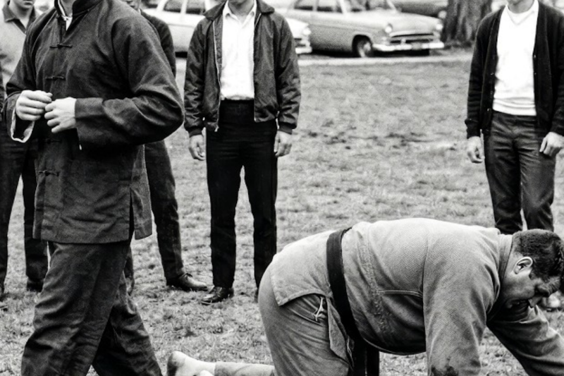 The Silence Before the Bowstring: How Bruce Lee Dismantled a Judo Black Belt’s Ego and Rewrote the Rules of Combat in a San Francisco Park